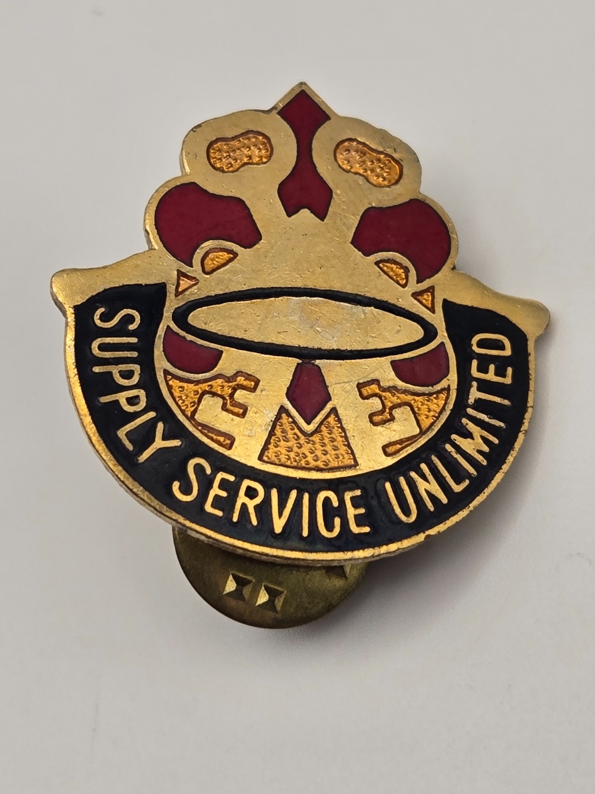 Vintage Army DUI Pin - "Supply Service Unlimited" 277th Supply & Service Btln