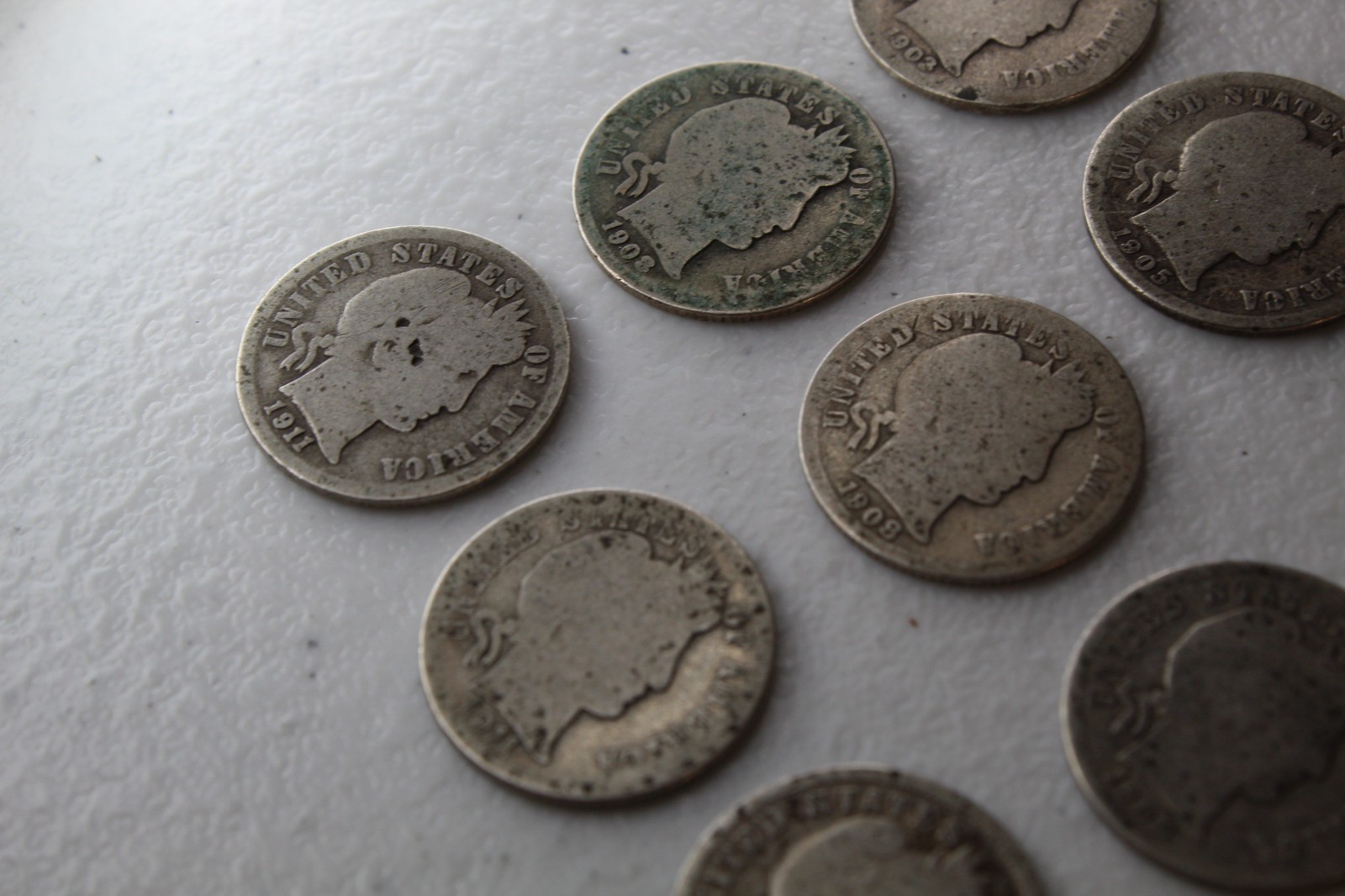 12 Very Old Very Worn Barber Dimes with dates