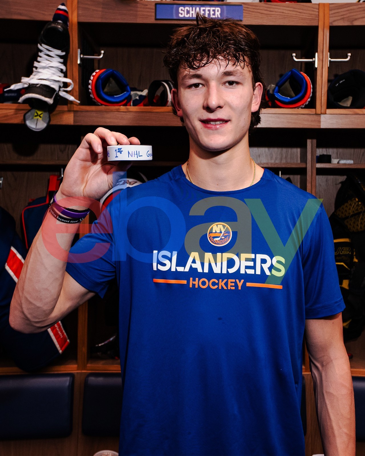 Matthew Schaefer First NHL Goal Puck New York Islanders 8x10 NHL Hockey Photo