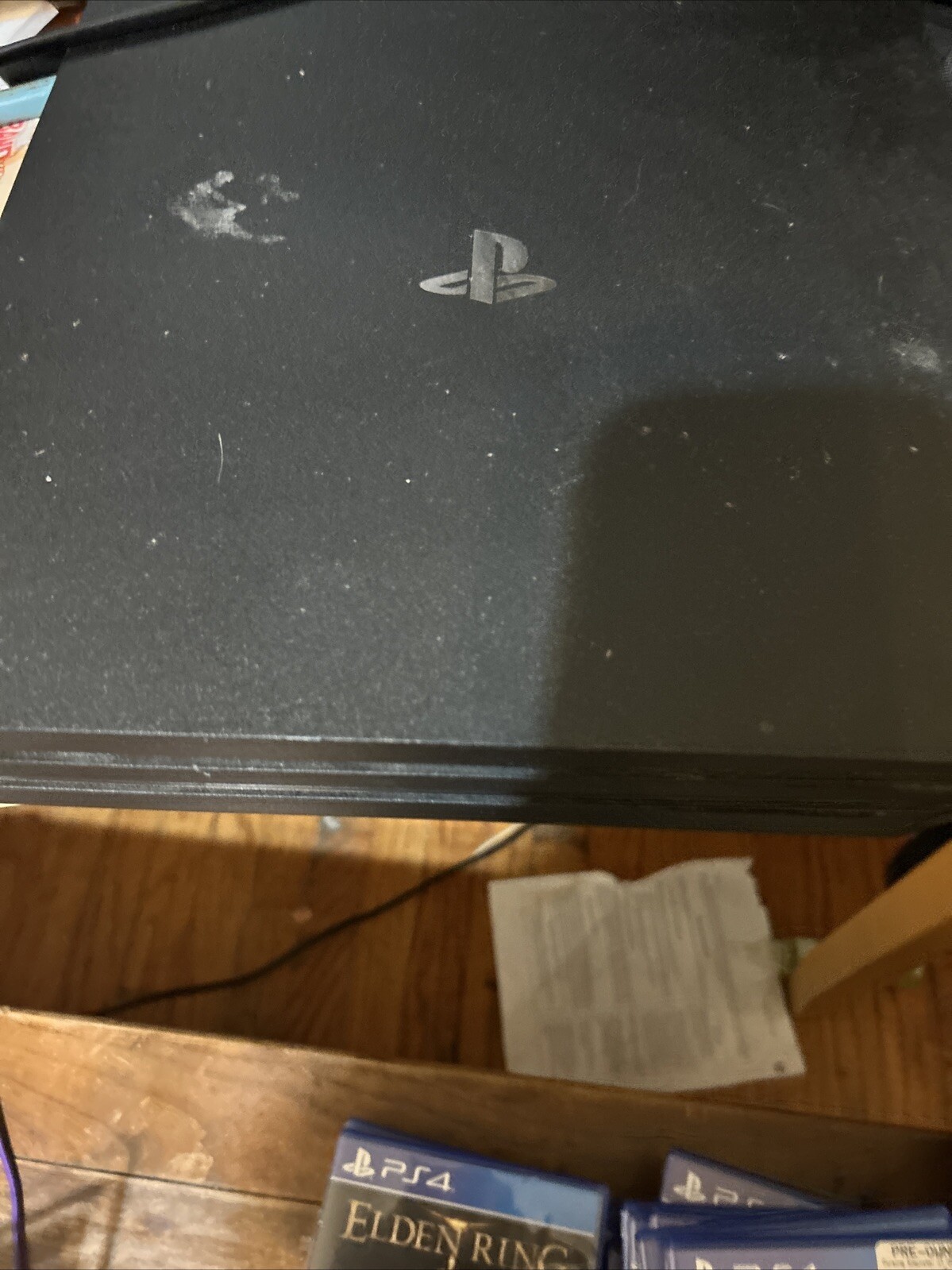 Comes With The Cables, Controller, And Works Completely Fine. Has No Issues