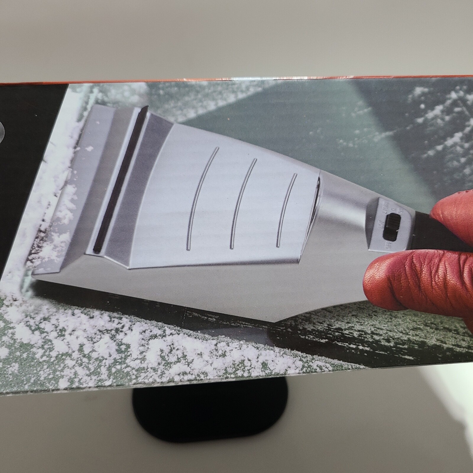 Heated 10" Ice Scraper with Built-In LED Light by Meridian Point.