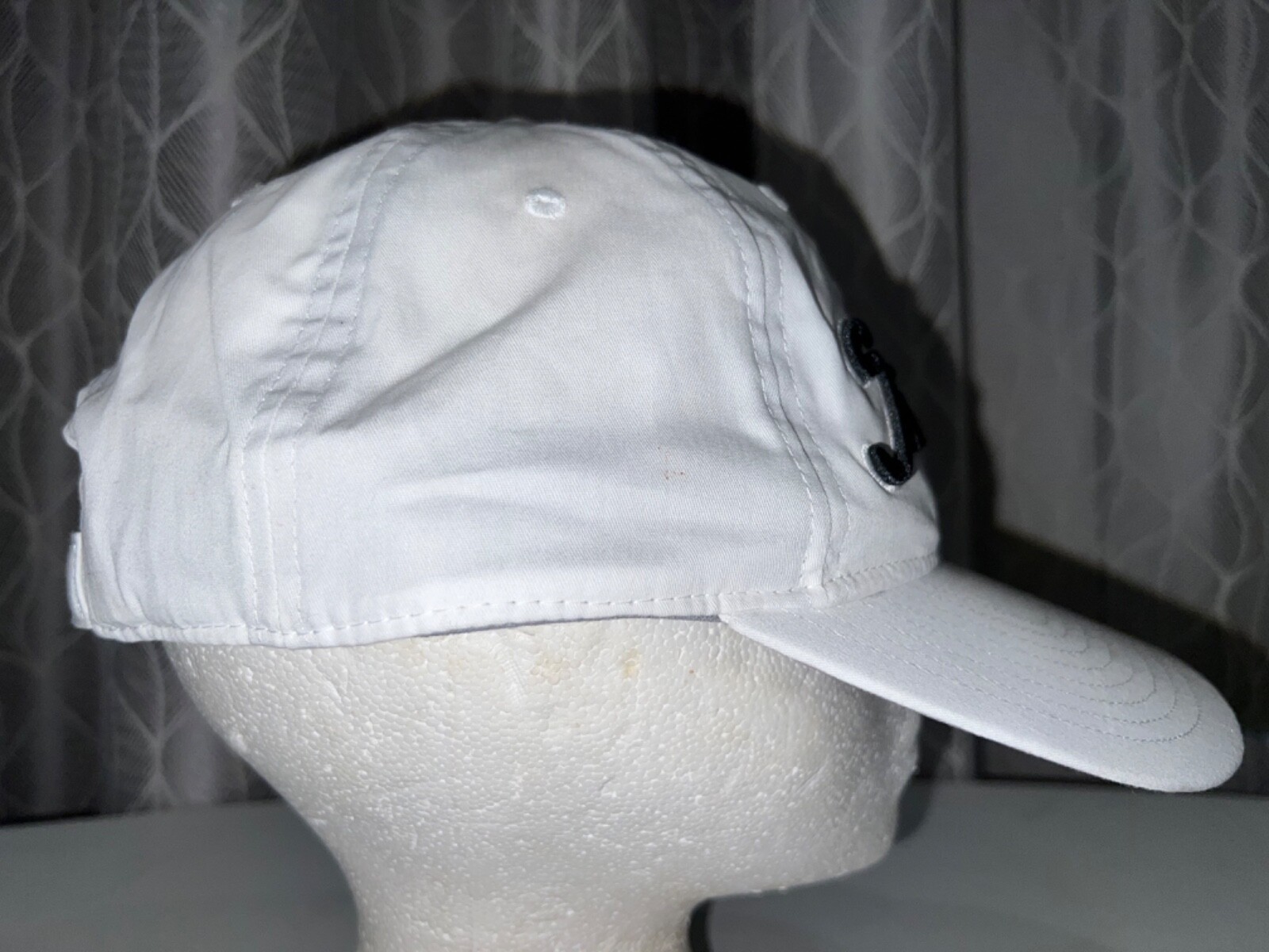 Titleist embroidered in Black on White on White Hat Cap Hook Loop Gray Band EUC