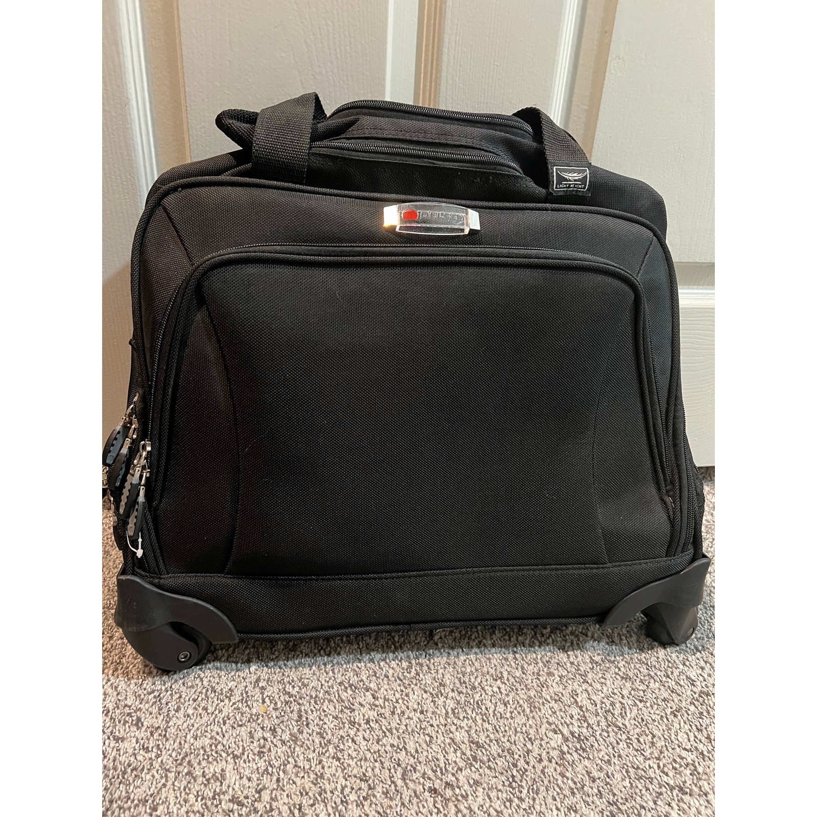 DELSEY Lightweight Black Laptop Carry On Wheels Extendable Handle Shoulder Strap