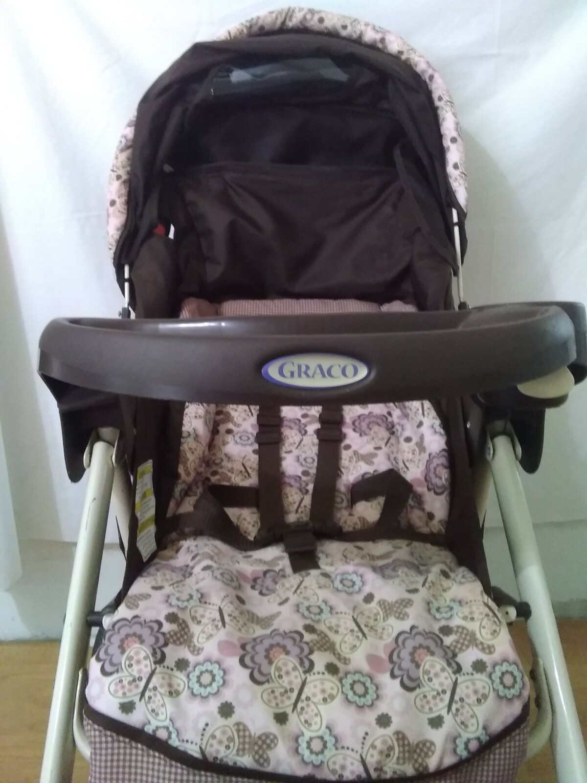 Graco Stroller walk behind with built in cupholders 