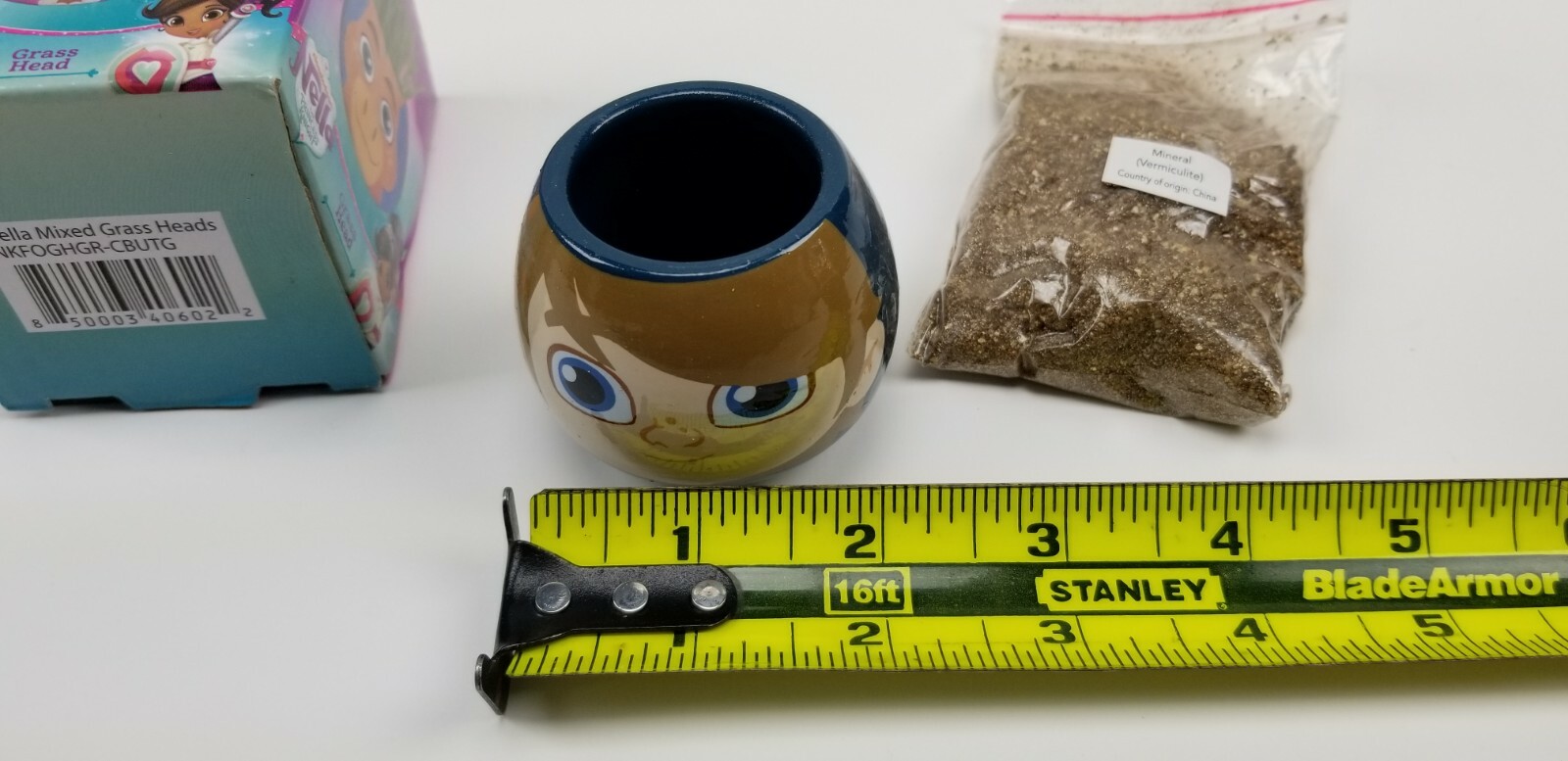 Nella Garret Grass Head