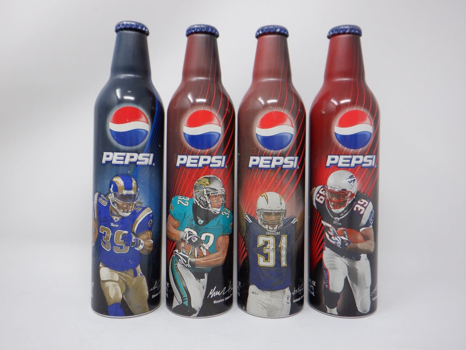 Unopened Collectable Alum. Pepsi NFL Bottle Lot of 4
