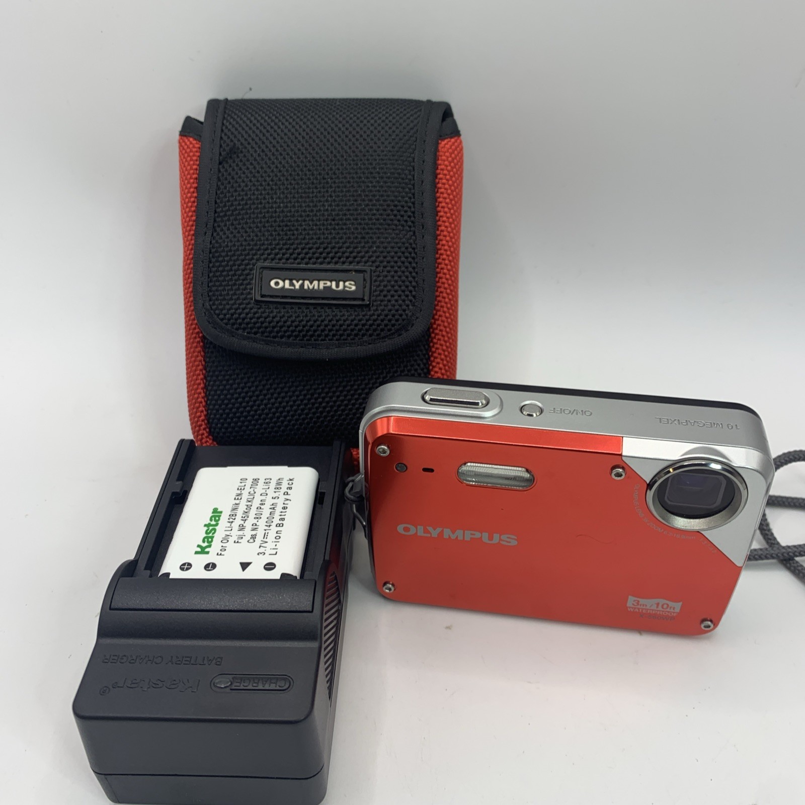 OLYMPUS X-560WP Red 10.0 MP 3X Optical Zoom Waterproof Digital Camera + Extras