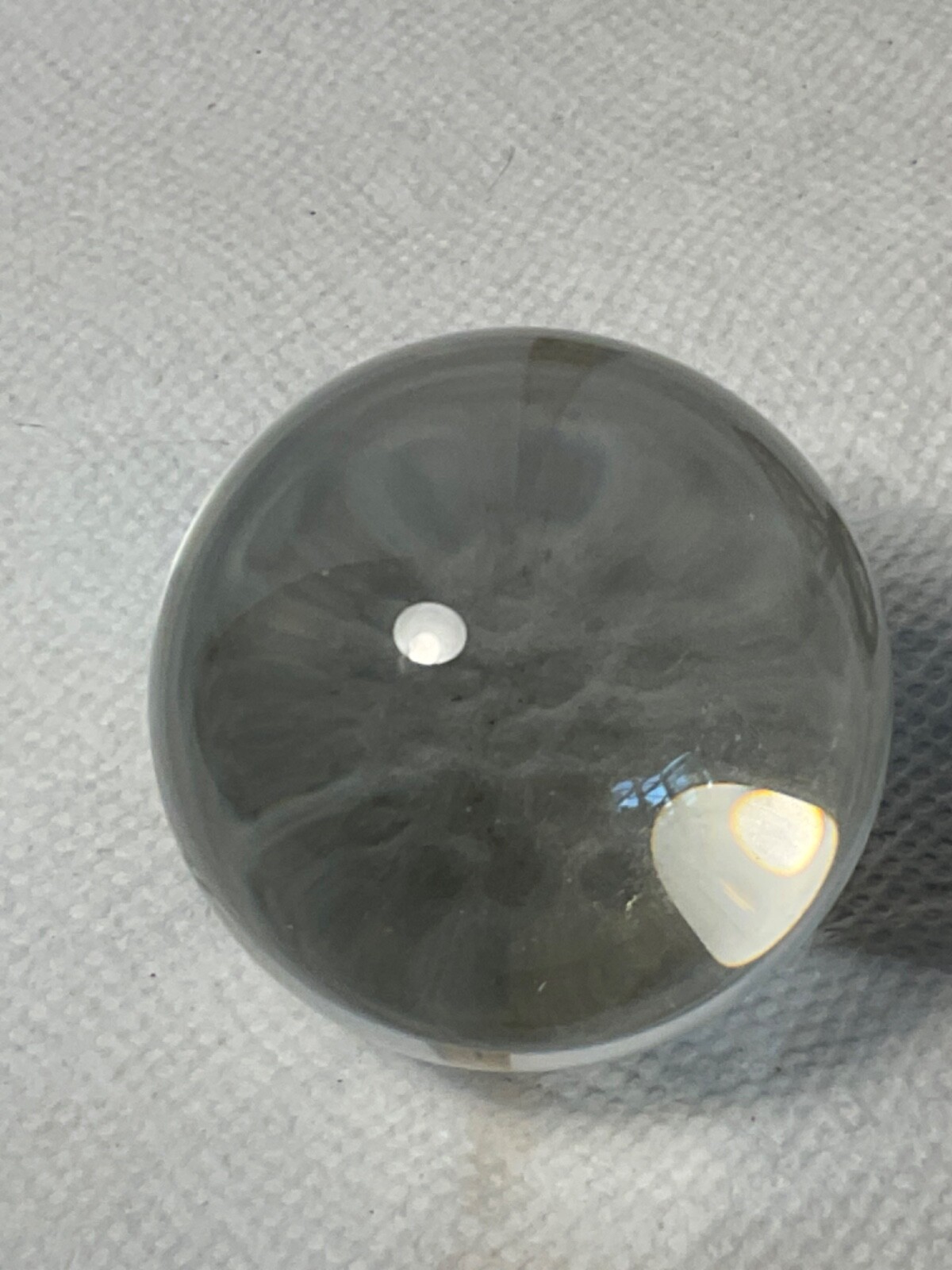 Clear round glass globe on brass stand 2”