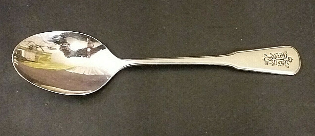 Oneida Village stainless oval soup spoon 6 3/4" black accent worn off