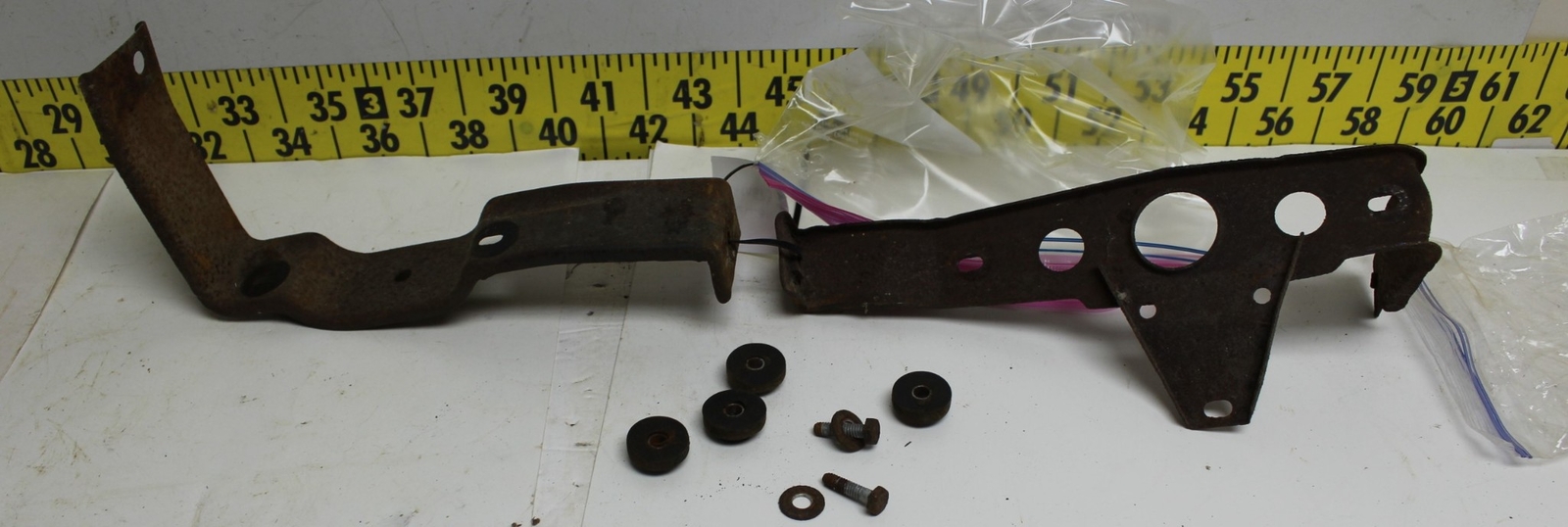 Used OEM GM RH LH Grille Brackets 1957 Oldsmobile  (699)