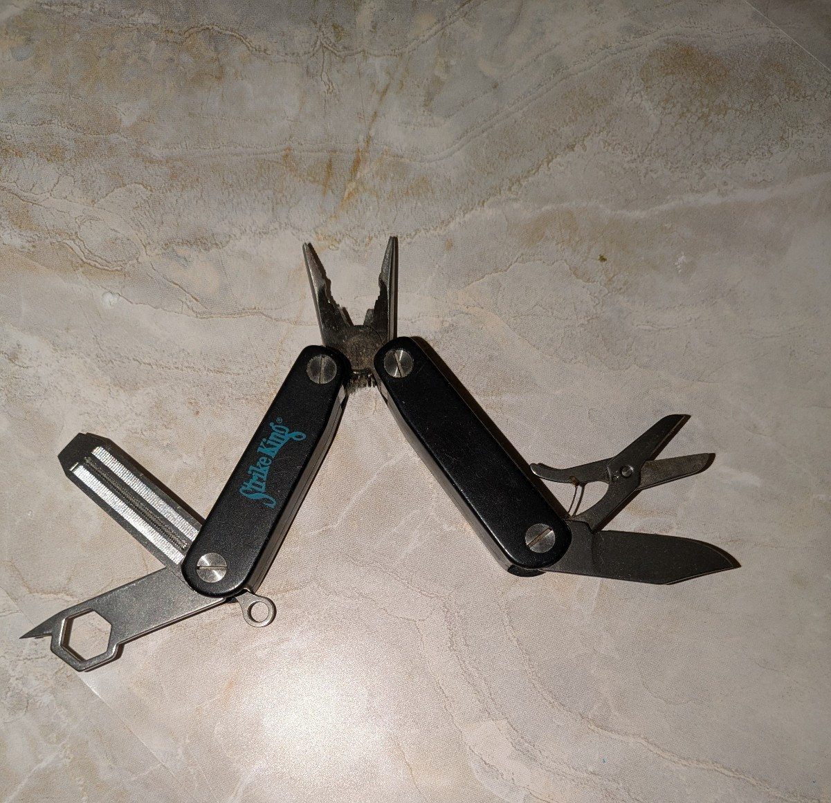 Black STRIKE KING Multi-Tool with Pliers File Scissors & More