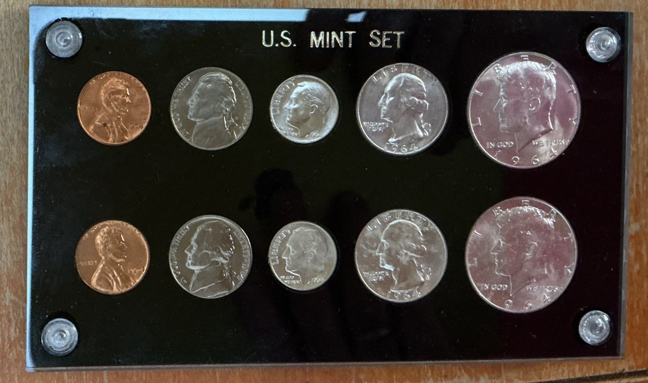 Beautifully Displayed 1964 P & D Mint Sets in a Capital Holder