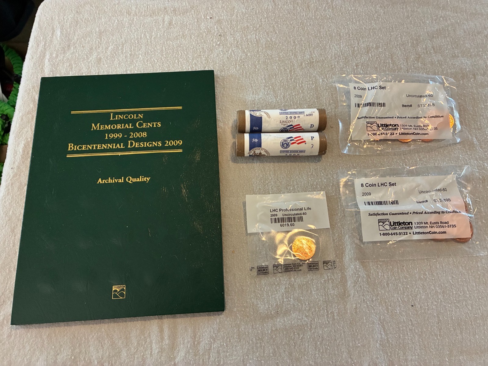 2009 Lincoln US Mint Rolls P & D + Two 8 coin sets and Lincoln Coin Folder.