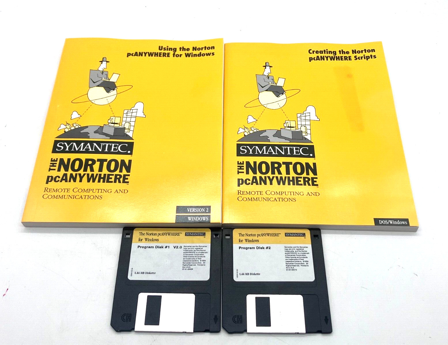 The Norton pcANYWHERE version 2.0 for Win 95 & NT, 2 Books + 2 Disks 1994