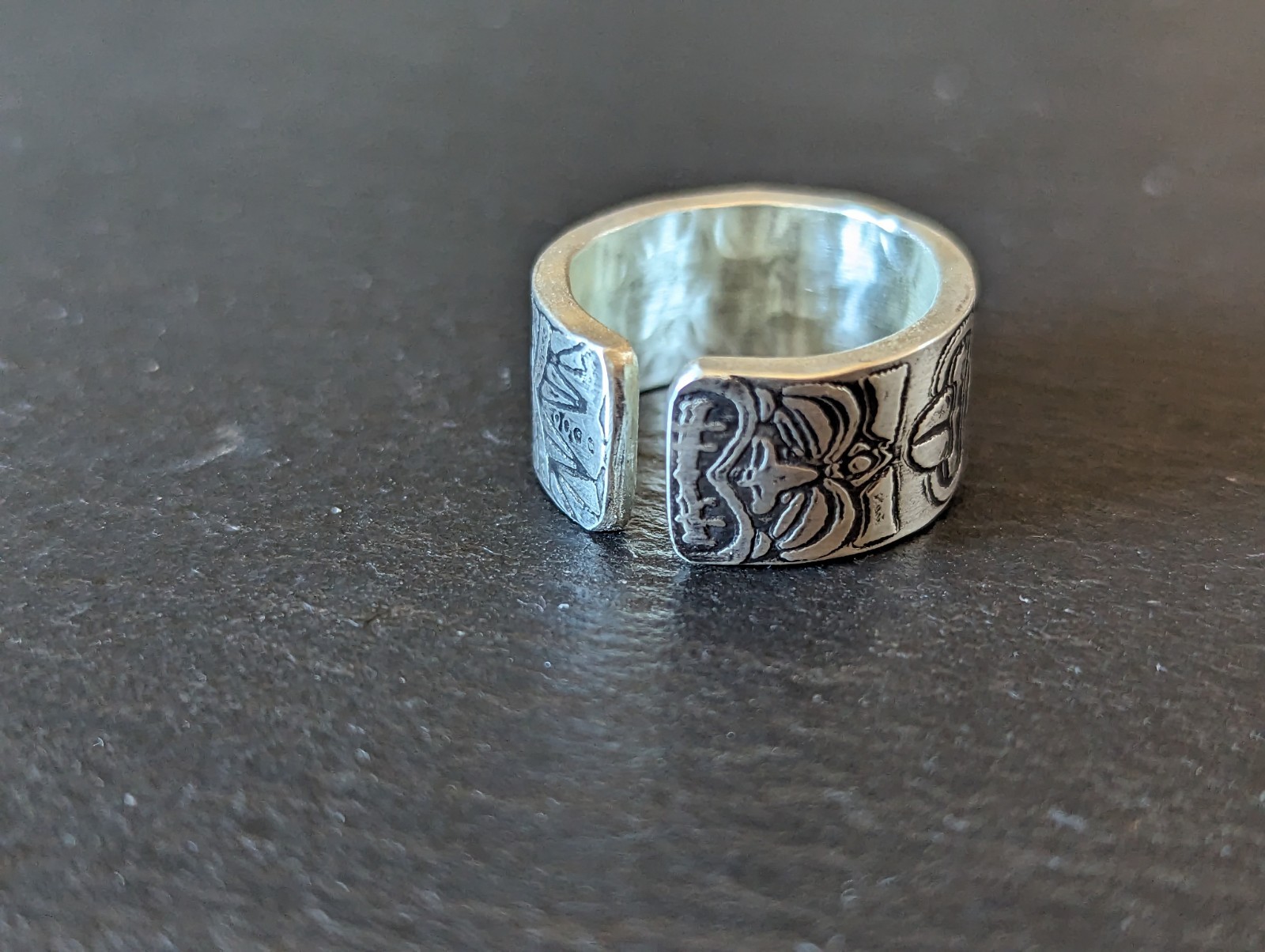 Thick sterling silver ring with tiki gods - handmade - open design