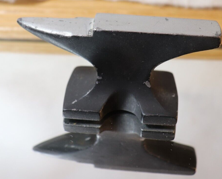 VINTAGE MINATURE BLACK & SILVER NON MAGNETIC IRON ANVIL 3-3/4" BY 1-1/8" WT 1 LB