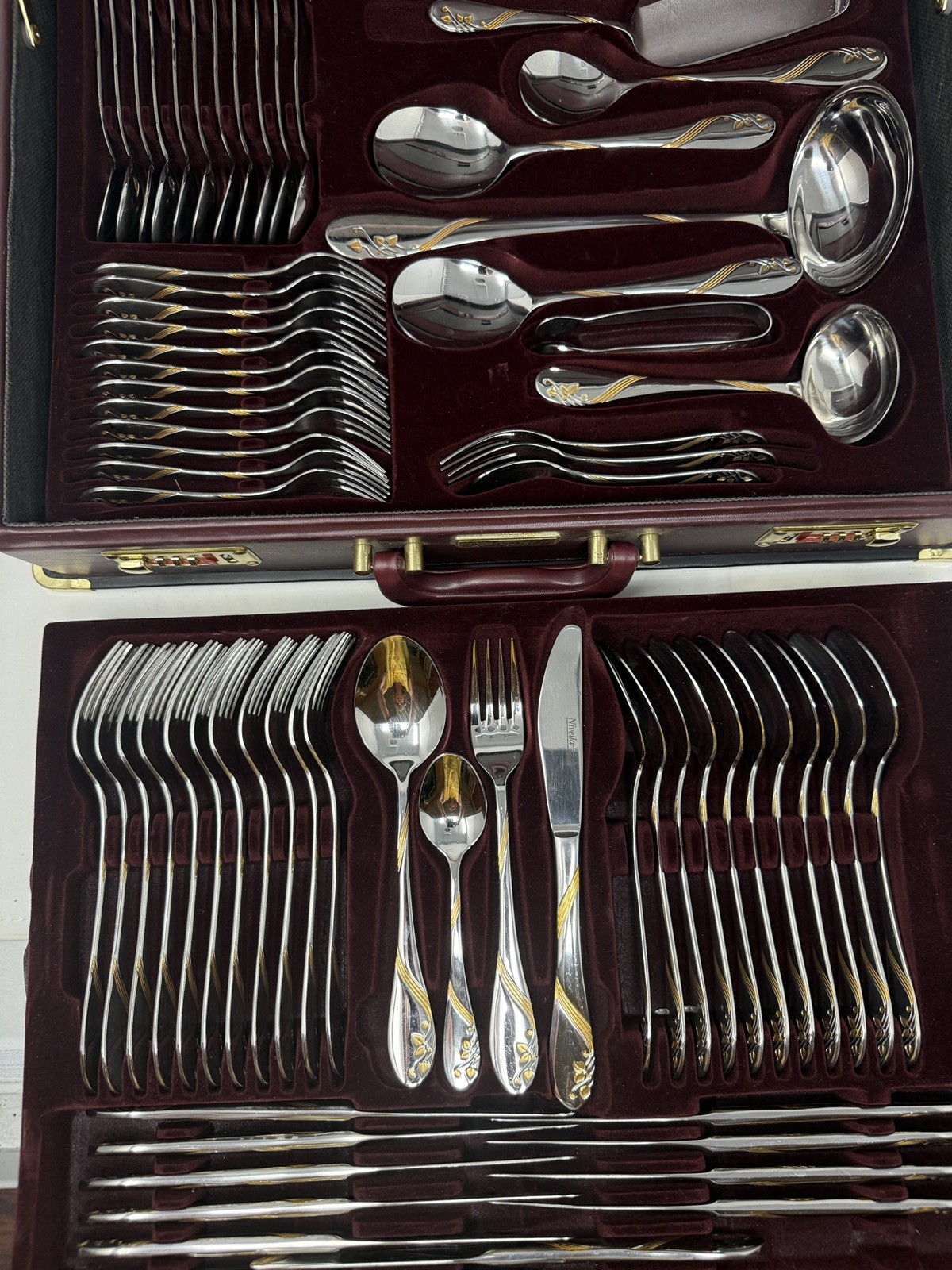 Nivella Solingen Stainless Steel 18/10 w/ gold plated accents 70 pc. Silverware