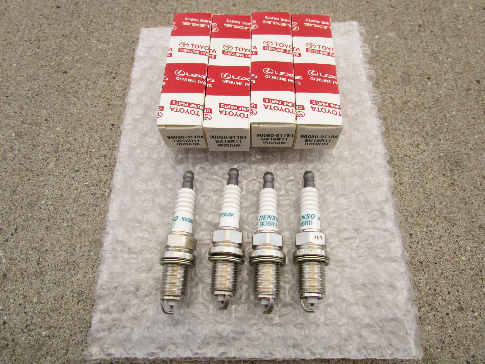 FITS: 06 - 18 TOYOTA YARIS 1.5L 4CYL SPARK PLUG QTY 4 OEM BRAND NEW