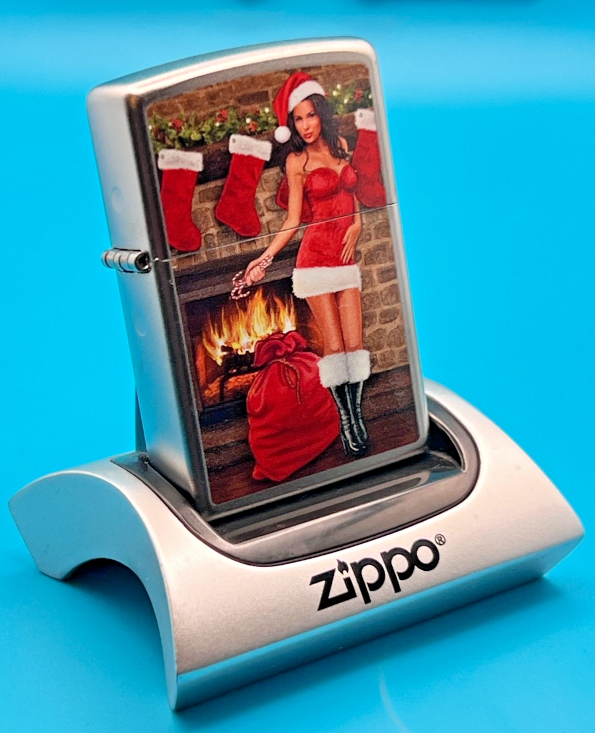 Genuine Brand New 2017 ZIPPO Lighter PULLING A CRACKER BY THE FIRE Satin Chrome
