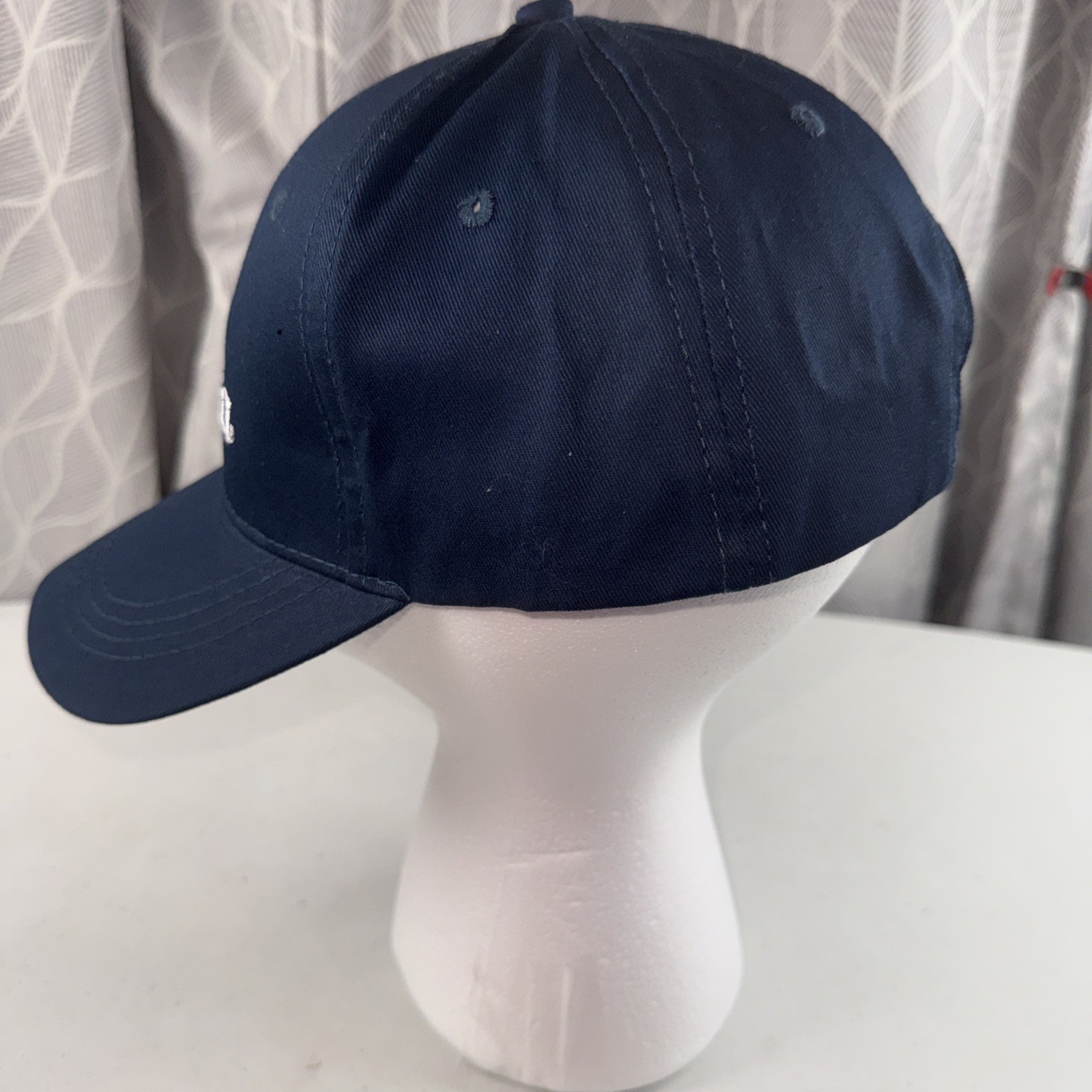 Corona in White Letters w Gold Crown on Navy Hat Cap Hook Loop