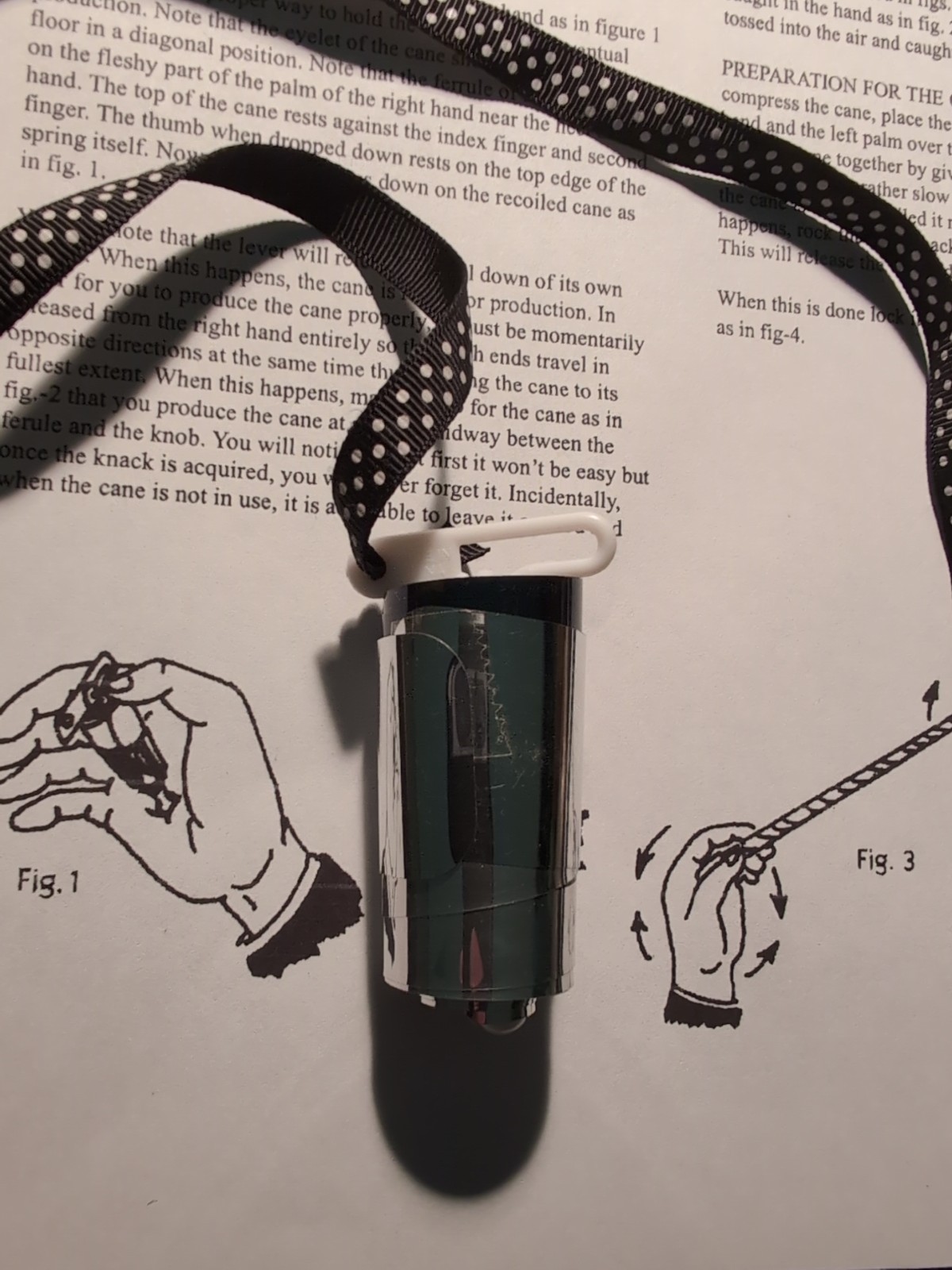 BLACK APPEARING CANE (silver top) - Plastic Magic Trick