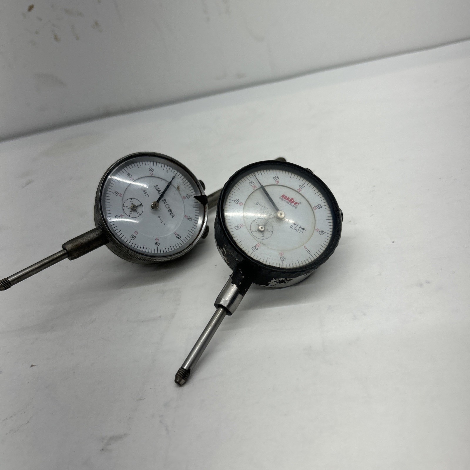 Lot Of 2 Dial Indicators. Mhc Brand .001” And Unbranded Cheap Dial Indicators