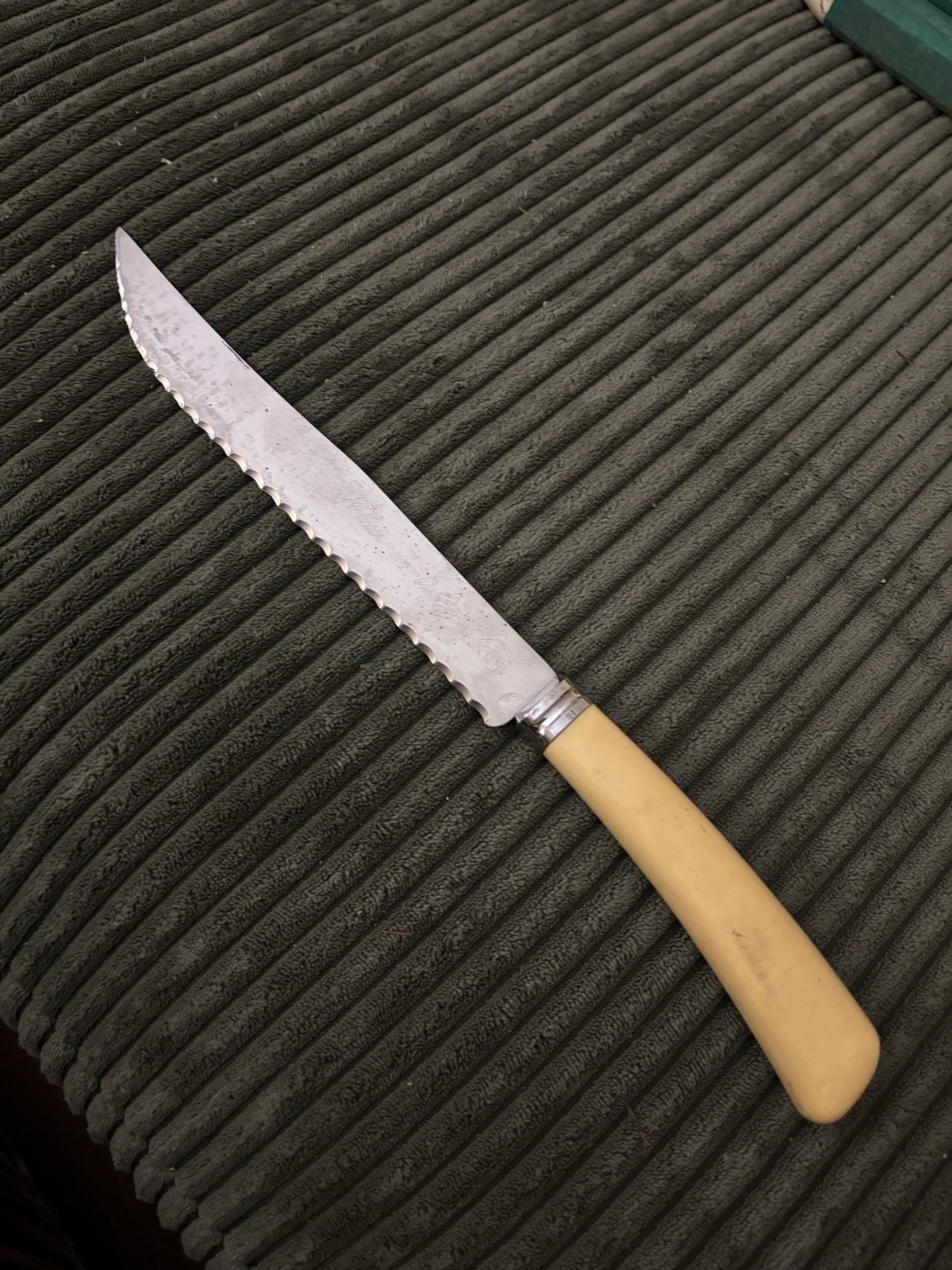 Vintage Quikut stainless steel knife with Bakelite handle