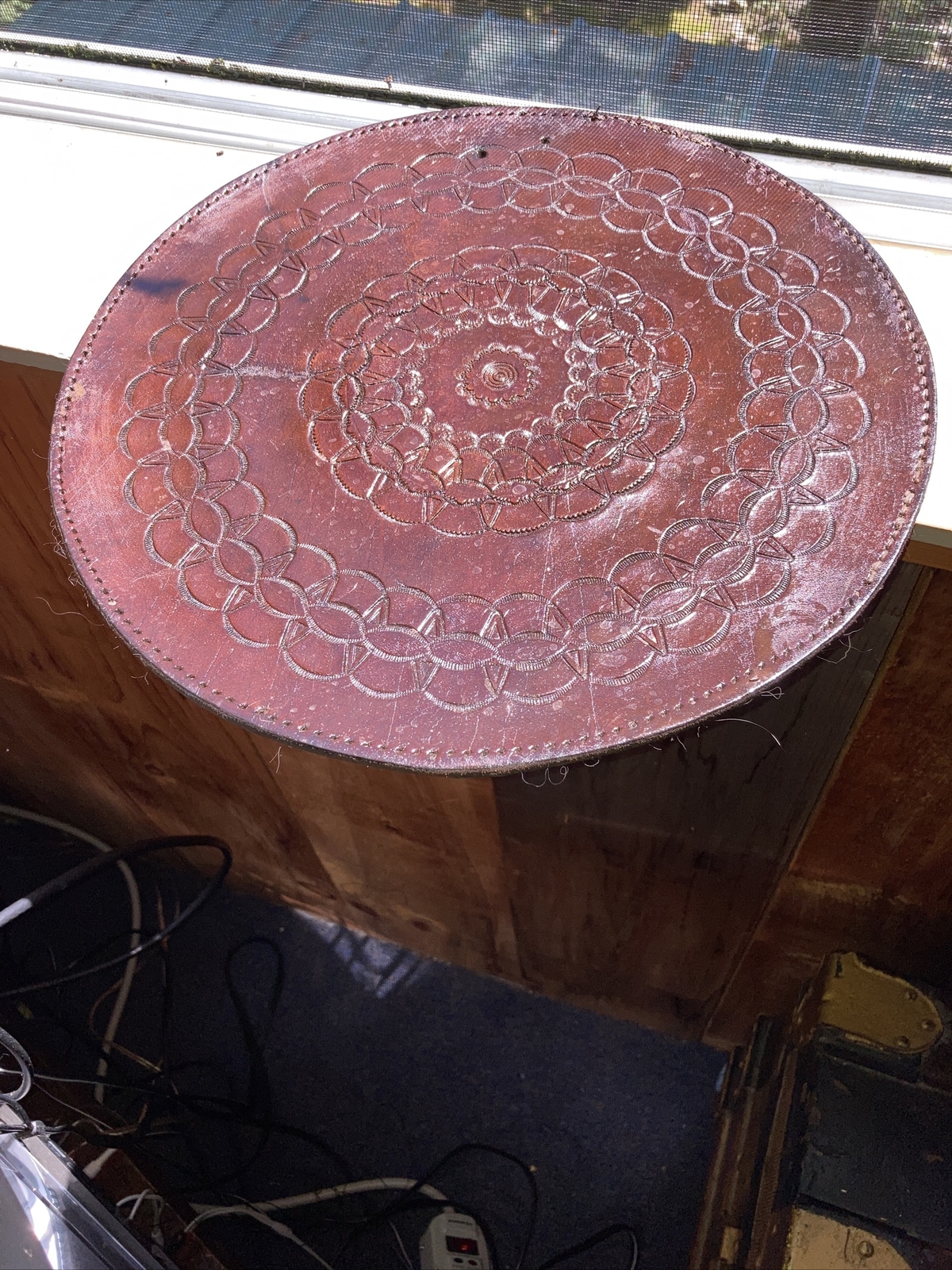 vintage embossed circular 12” leather piece