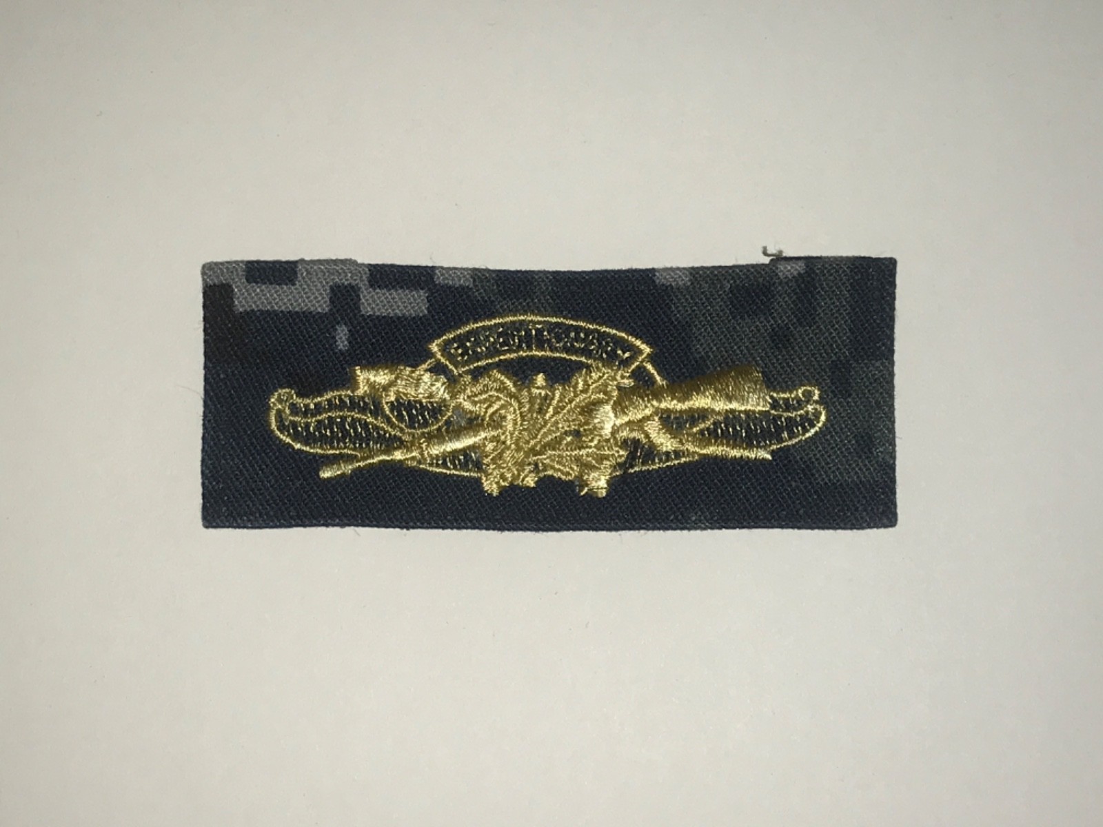 US NAVY EXPEDITIONARY WARFARE SPECIALIST NWU I CAMO Blue Camo Badge