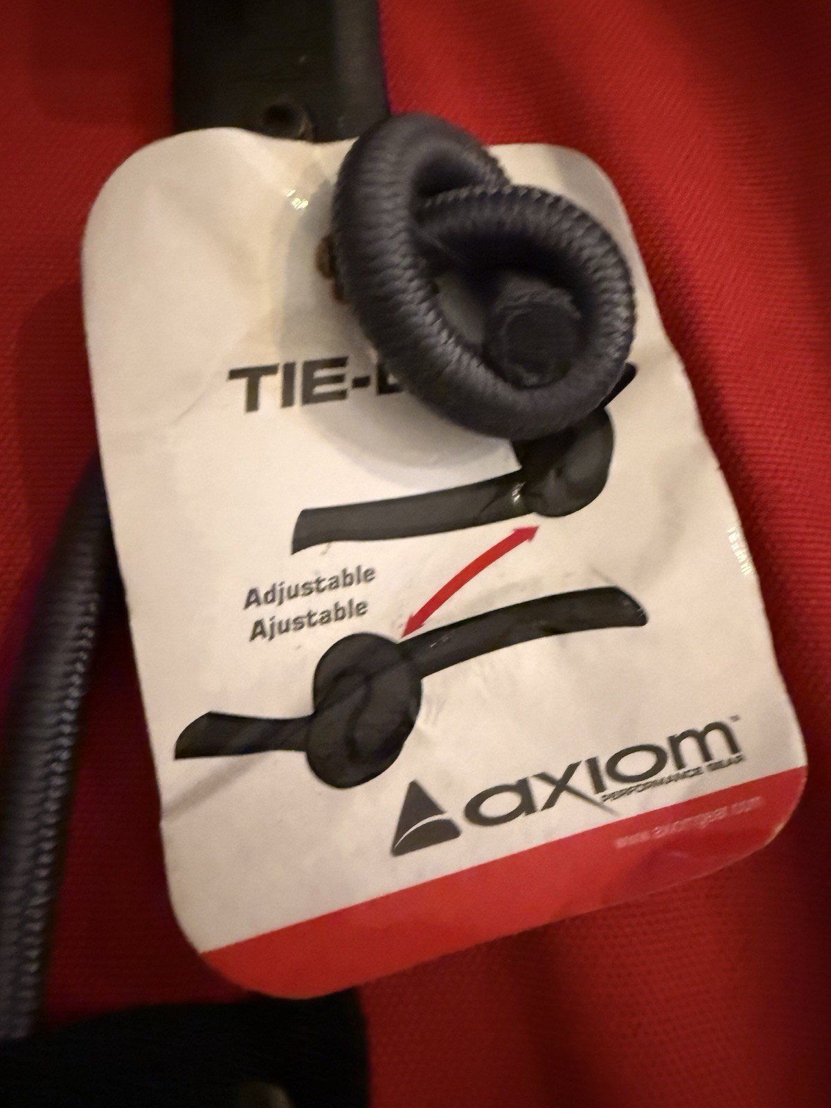 Axiom Tie-Lock Roll-Top Backpack Red/Black Adjustable Straps Buckle Logo