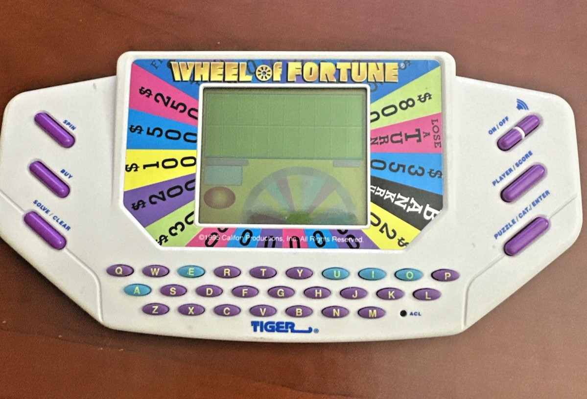 Wheel of Fortune 1995 Tiger Hand Held Electronic Game w/ Cartridge Vintage Works
