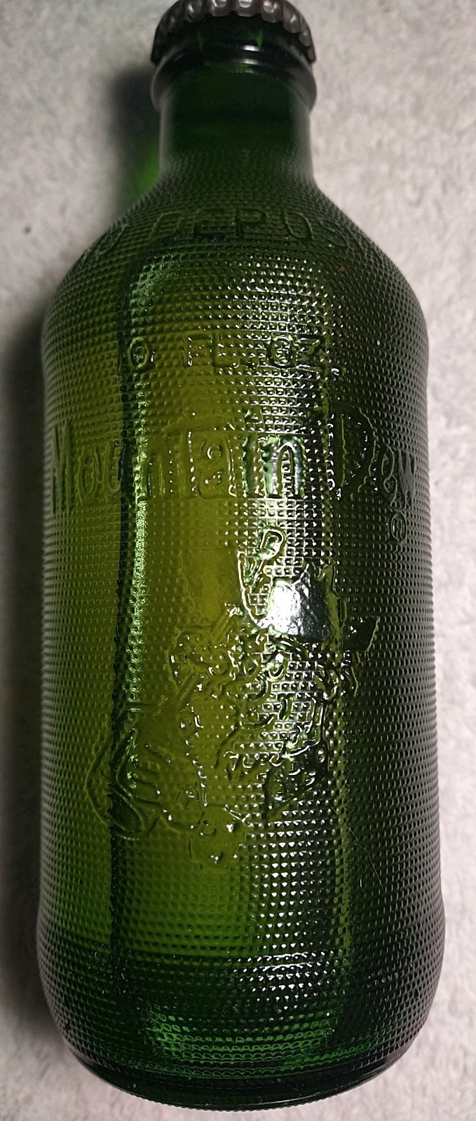 EXTREMELY RARE* FULL* 10oz Mountain Dew "Textured/Embossed" Glass Bottle     #20
