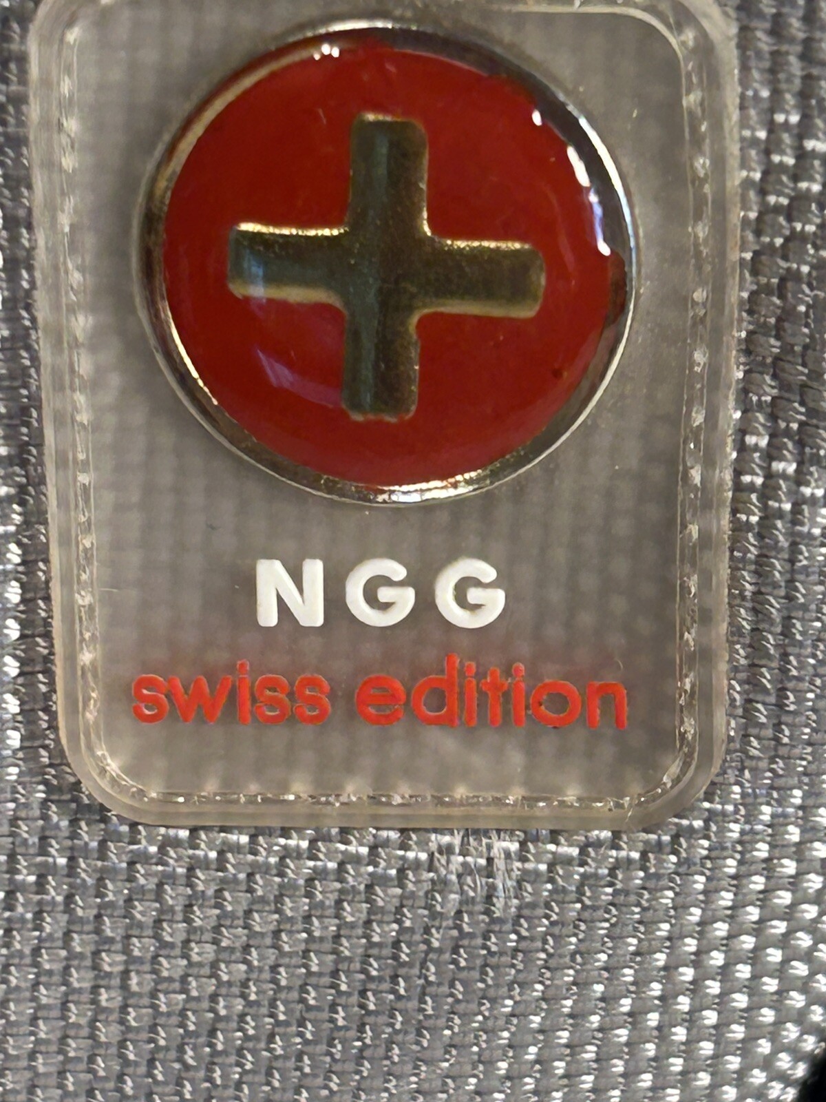 Blue/Grey NGG Swiss Edition Backpack with blue water bottle computer school