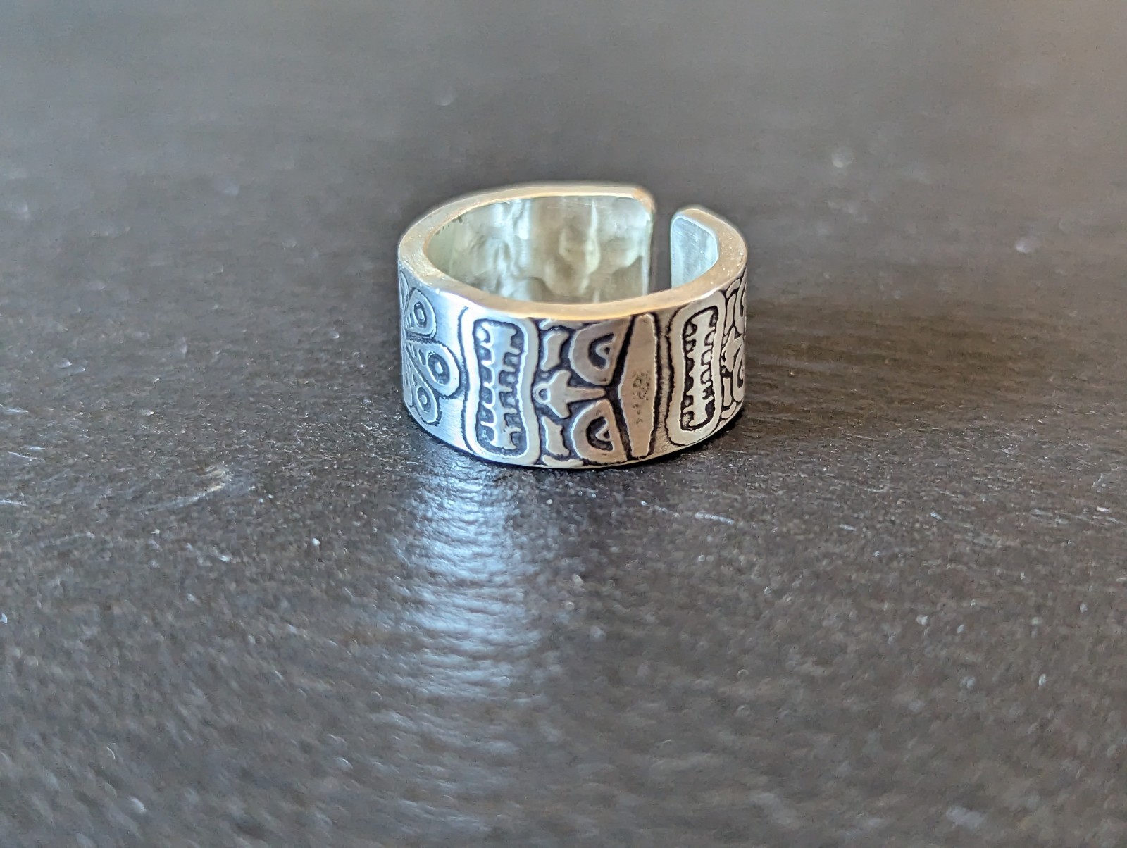 Thick sterling silver ring with tiki gods - handmade - open design