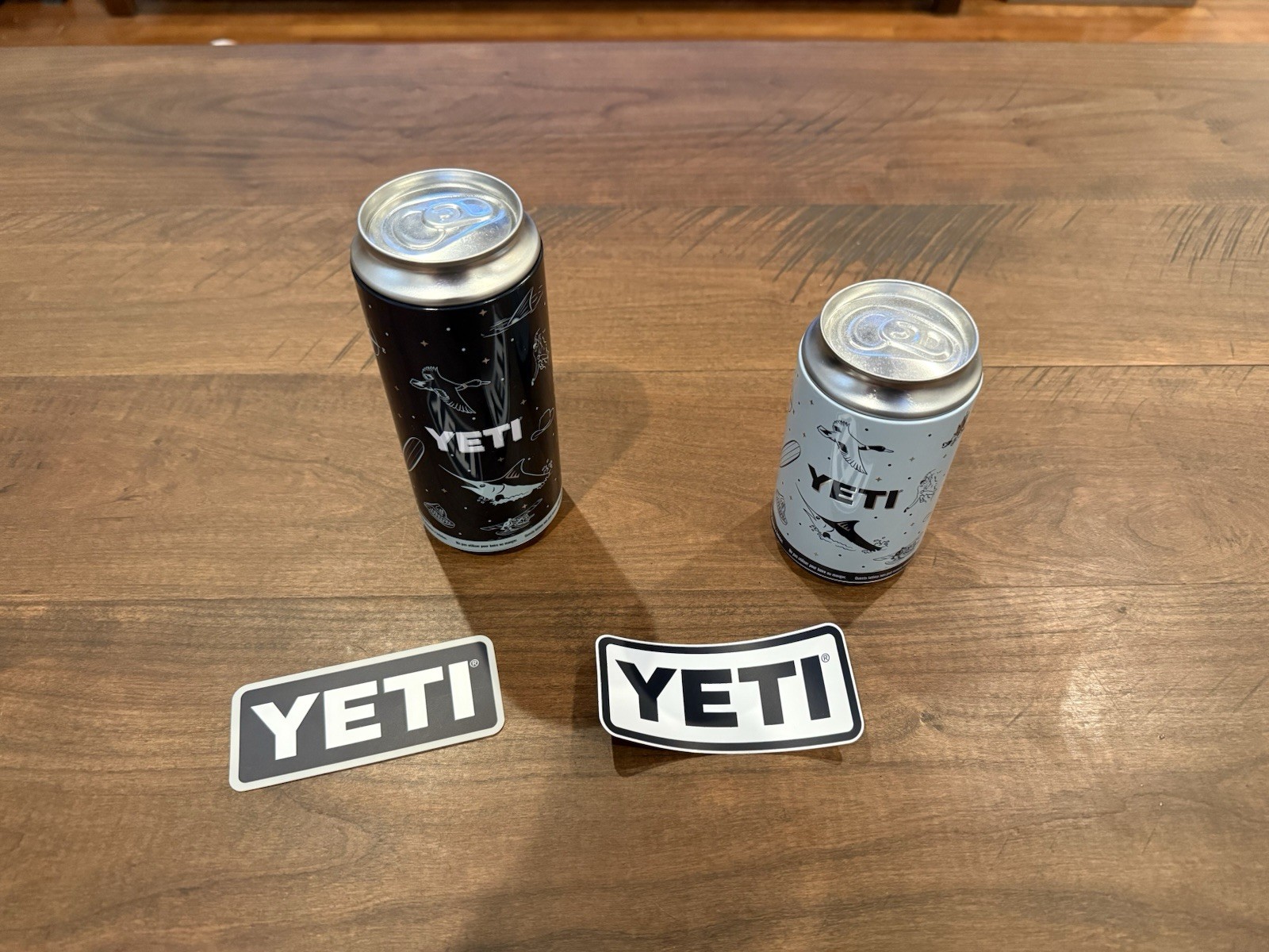 Two Yeti Stash Cans With Stickers