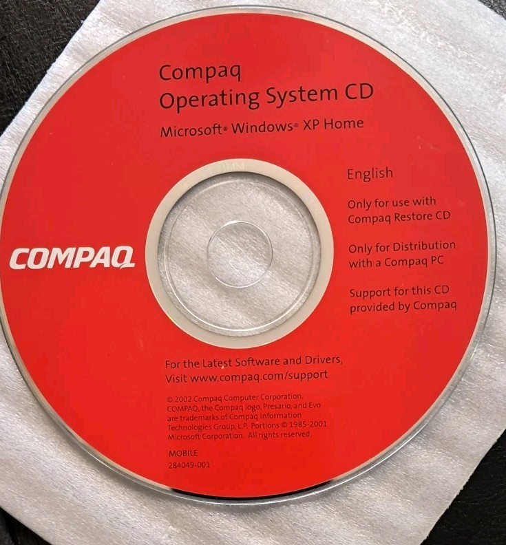 Compaq Operating System CD & QuickRestore CD Microsoft Windows XP Home 2002