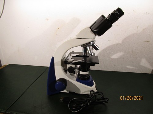 Unico G380 Microscope w Four Objectives