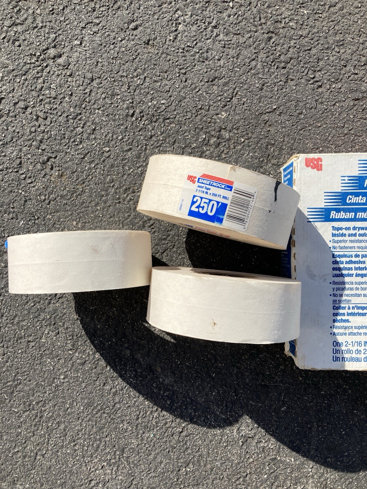 4 rolls sheet rock tape , one roll with wire .