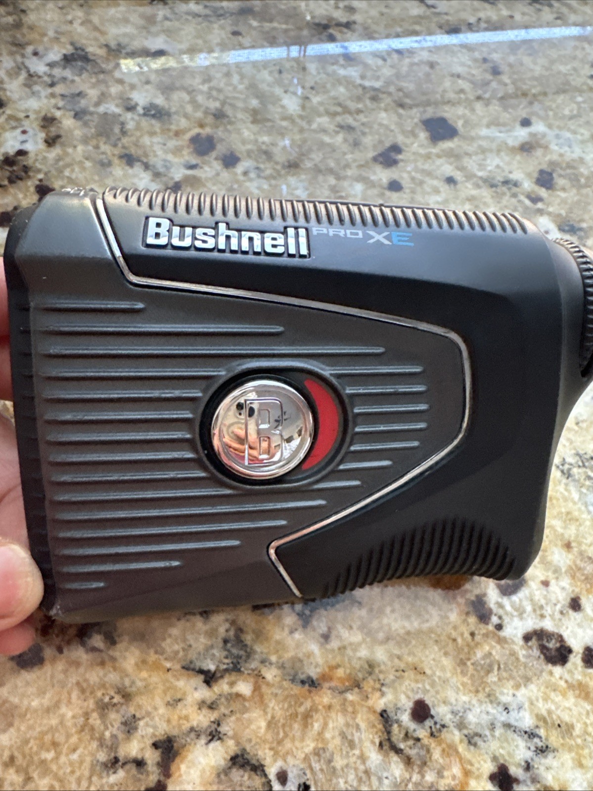 Bushnell Pro XE Slope Laser Golf Rangefinder With Bite Magnetic Grip. Excellent