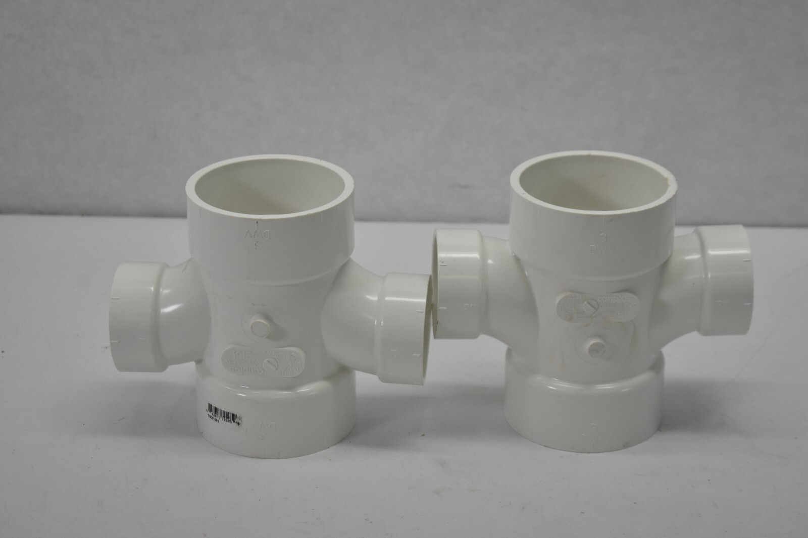 Lot of 2 Genova 700 Series Reducing Double Sanitary Tees White PVC 192181