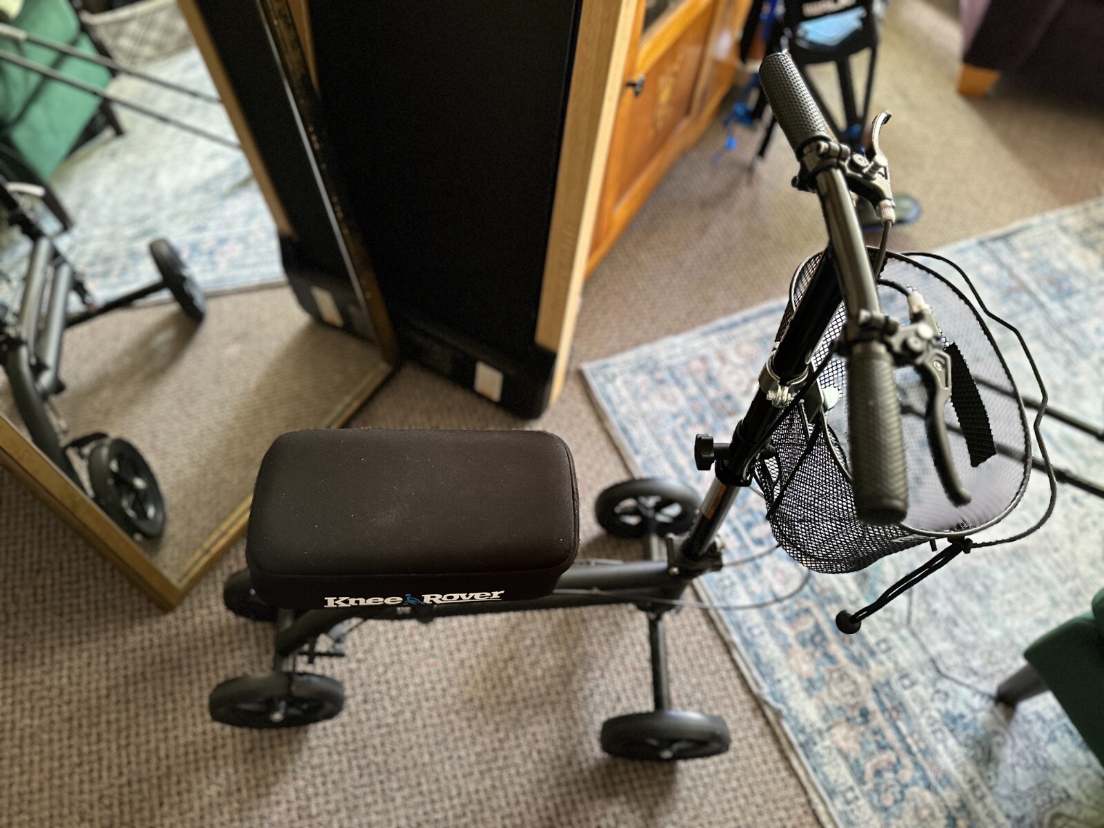 Black metal KneeRover mobility knee scooter