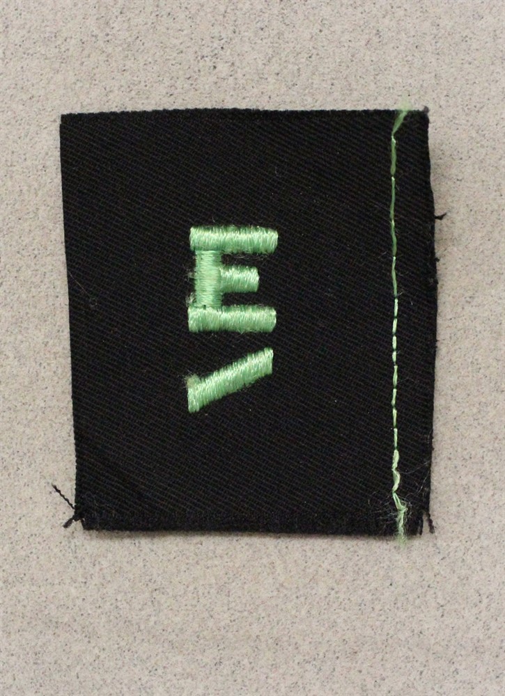 USN Navy Distinguishing Mark 1150: Navy "E", 2nd Award - green on navy blue