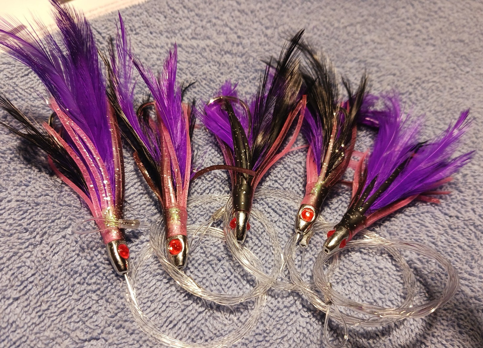 Tuna Feathers Black Purple 4" . 5 Pieces  1/4 oz Offshore -Mahi- Tuna