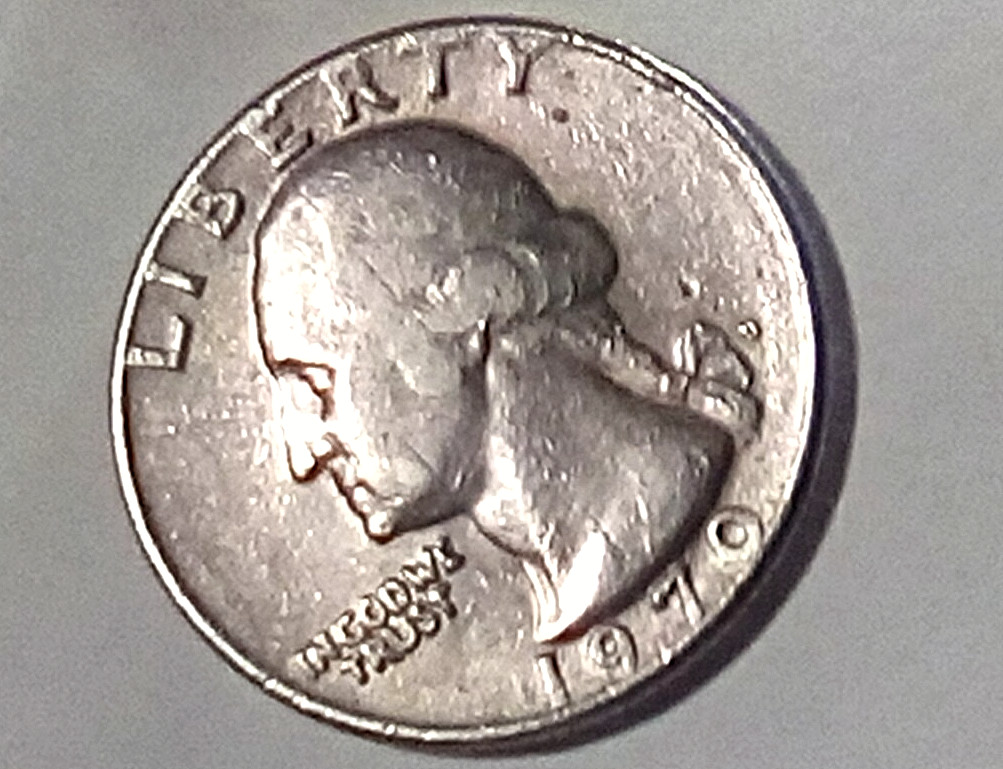 1970 D  Washington Quarter Errors both sides weighs 5.55 grams letters on rim.