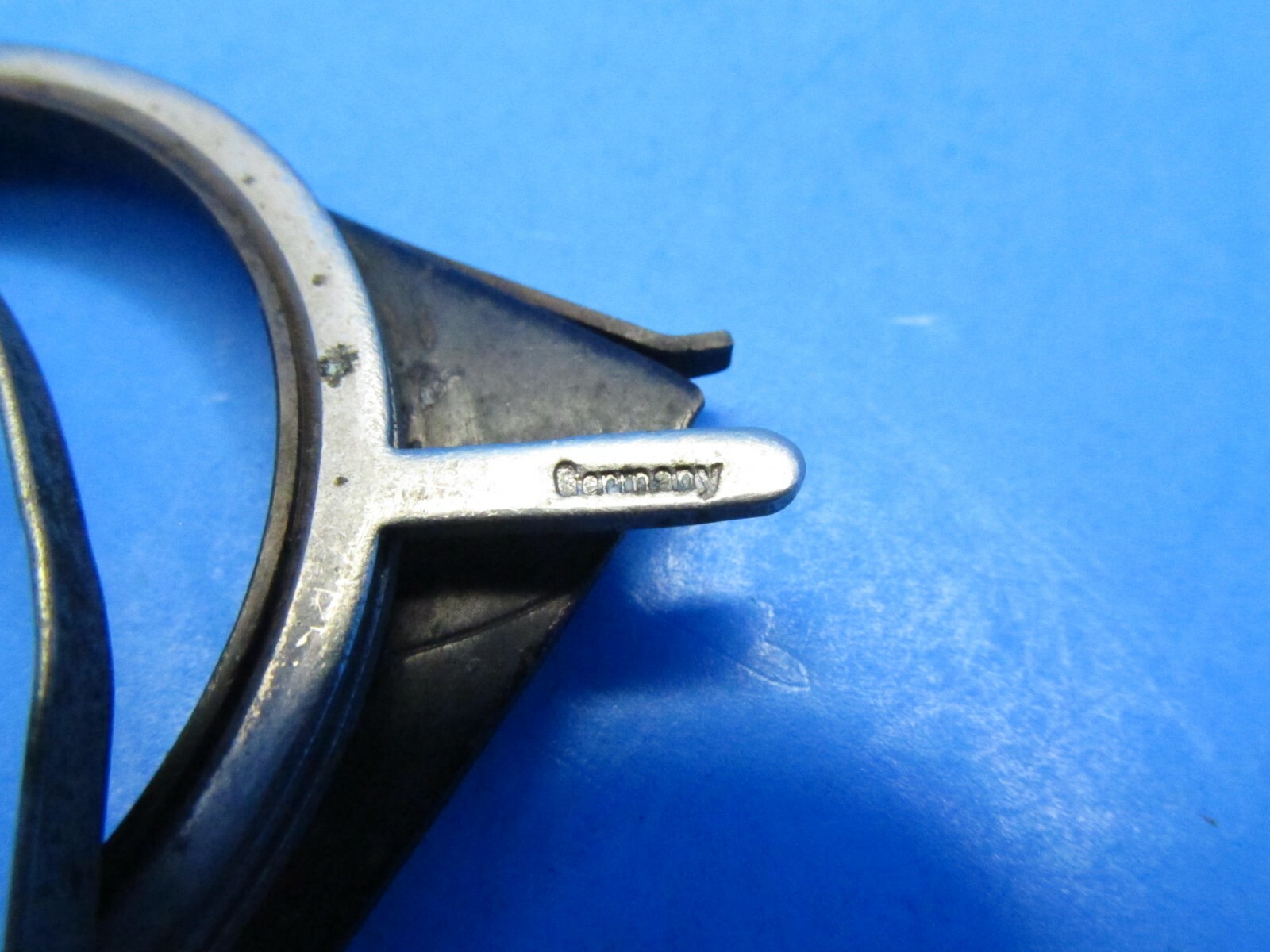 unique small filter holder marked RHACO DRP GERMANY attaches w/ spring clamps