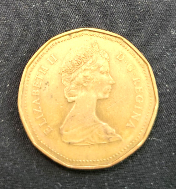 1987 Canada Loon Dollar circulated Canadian One Dollar Coin $1