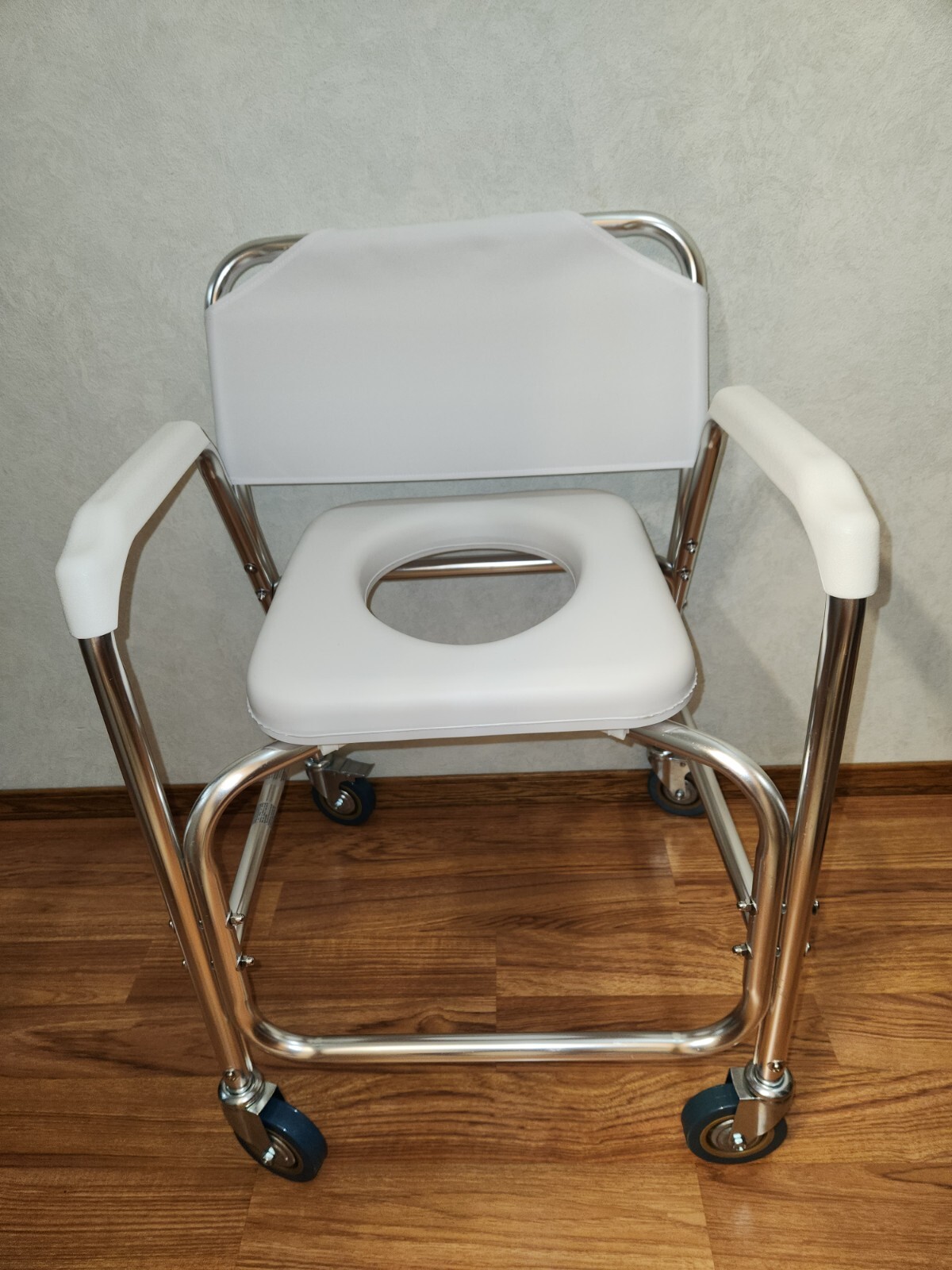 RAISED TOILET SEAT  WITH ARMS ~~  BRAND NEW,  REAR WHEELS HAVE LOCKS (ON OR OFF)