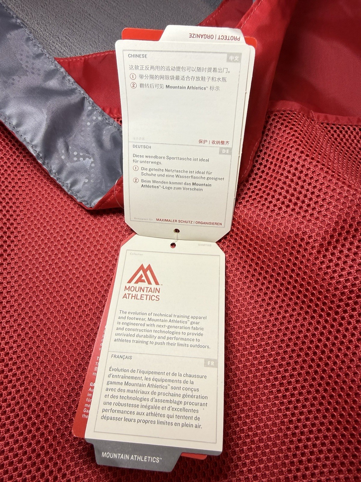 The North Face Mountain Athletics On The Run Bag Red Gray 23L Mesh Pocket