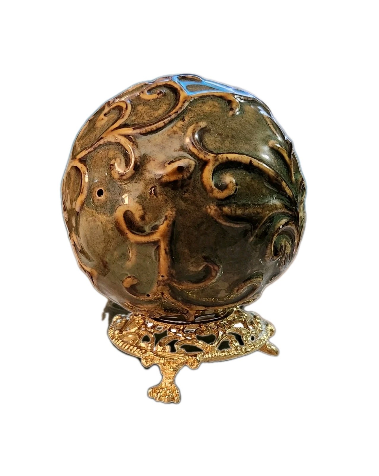 Art Deco Sphere With Embossed Swirl Design In Green Sits On Stand For Display