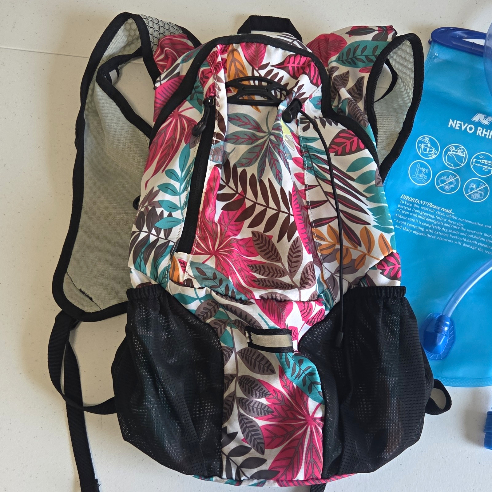 NEVO RHINO 2L Hydration Backpack Black Pink Teal Leaf Print Hiking Cycling